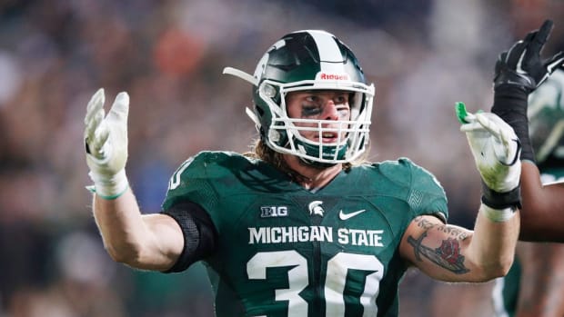 For Riley Bullough and the rest of his family, the Michigan State-Notre Dame rivalry is a longstanding family affair
